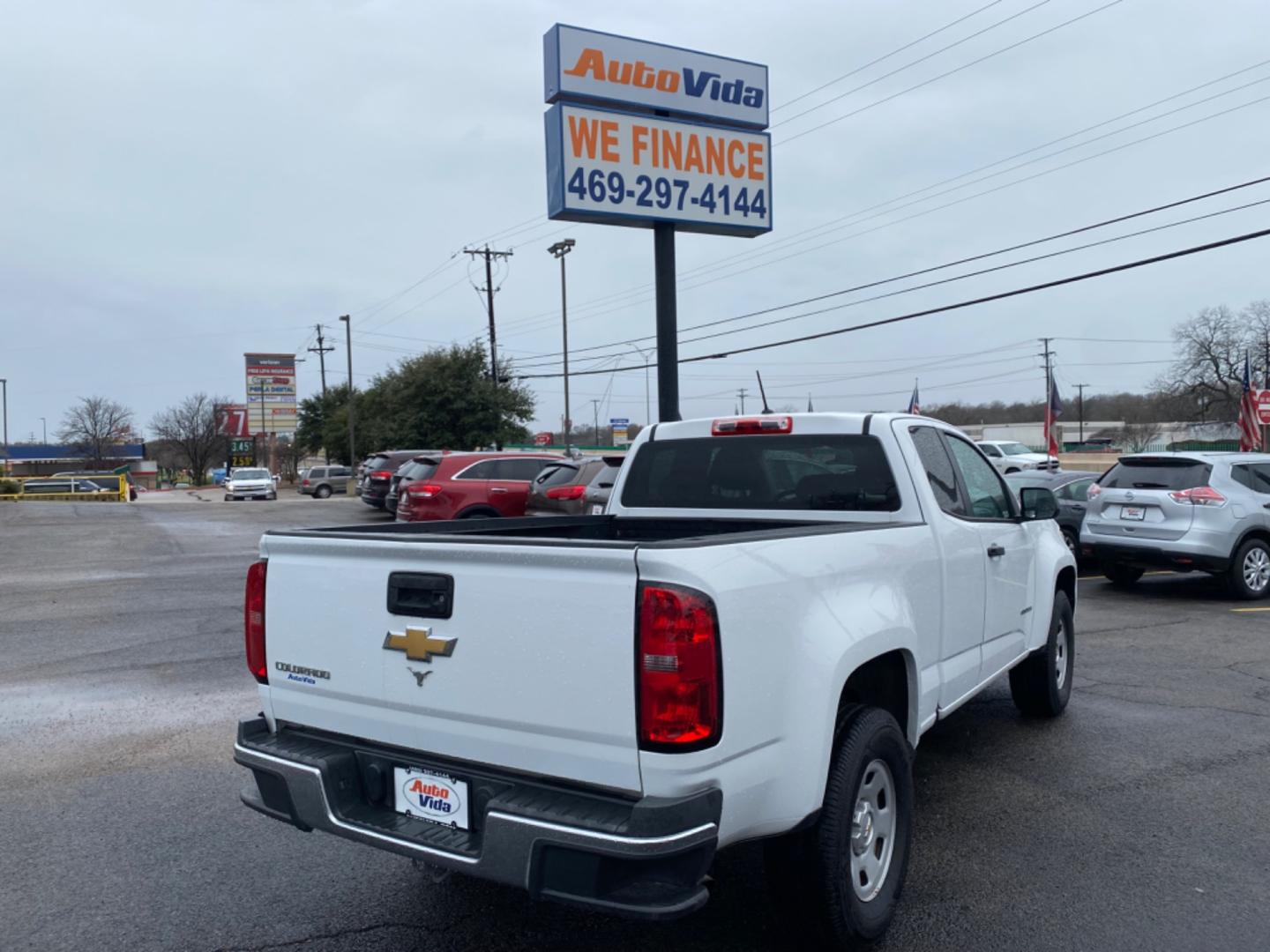 2015 WHITE Chevrolet Colorado WT Ext. Cab 2WD (1GCHSAEA6F1) with an 2.5L L4 DOHC 16V GAS engine, 6-Speed Automatic transmission, located at 420 I-35E, Lancaster, TX, 75146, (469) 297-4144, 32.593929, -96.823685 - Photo#3